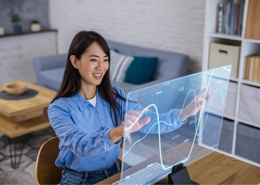 Smiling woman working with virtual screen